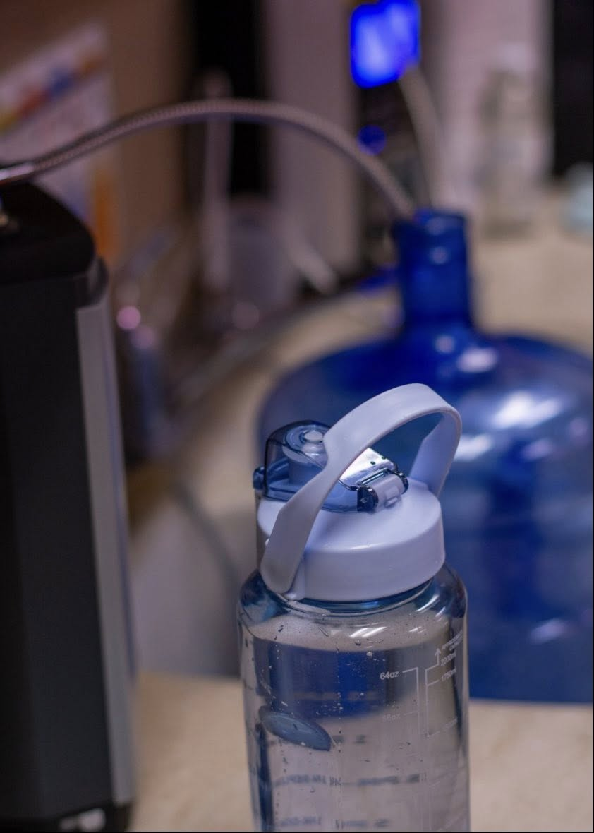 Filling a gallon of hydrogen-rich alkaline water at Omaha's Water Store