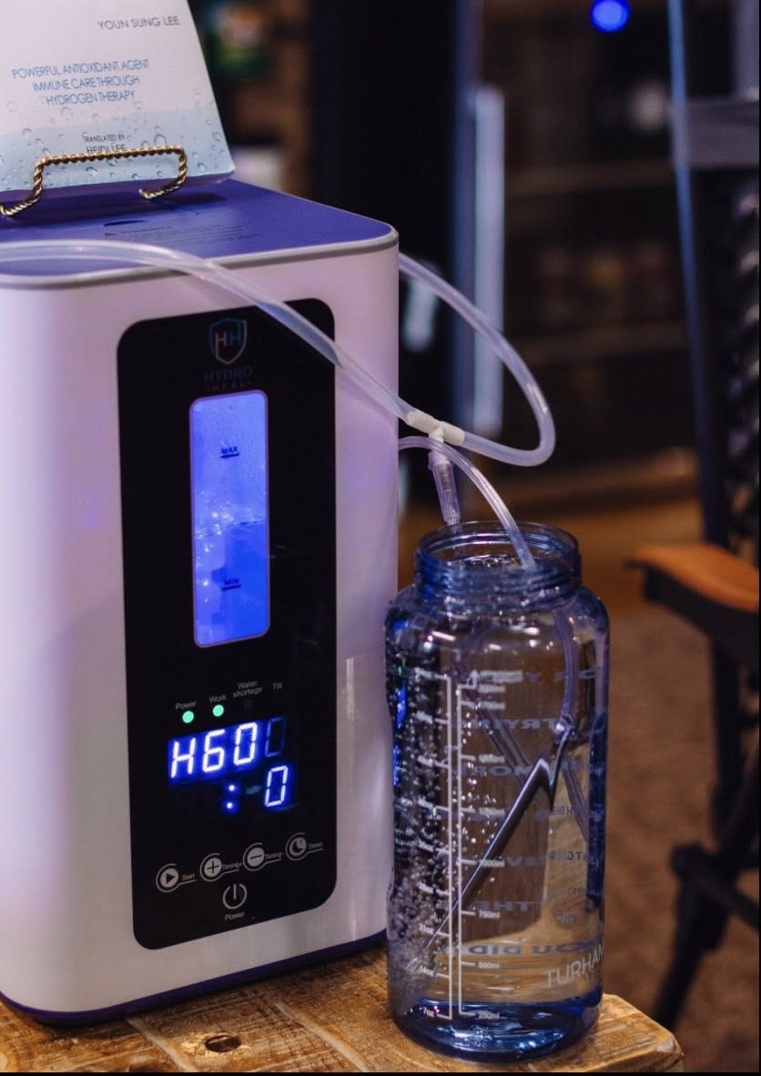 Hydrogen inhalation machine in action with bubbling water chamber