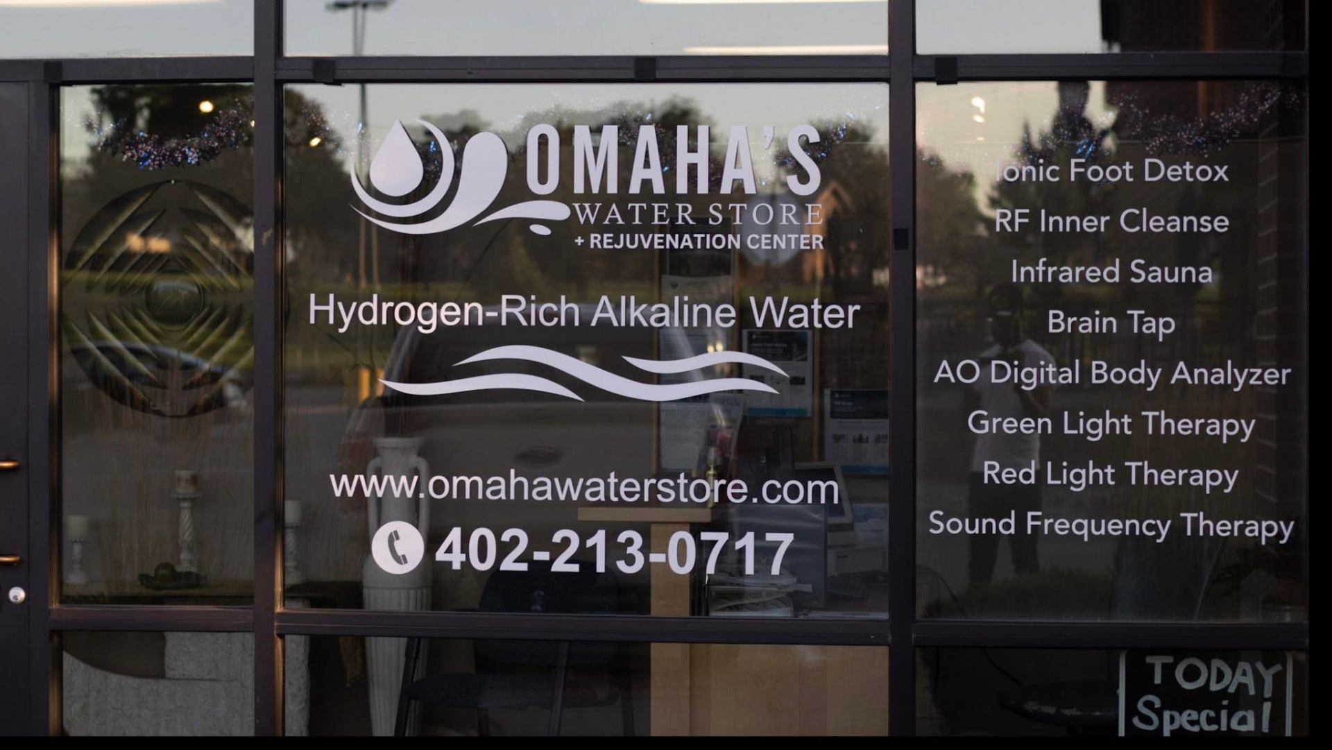 Studio storefront featuring hydrogen-rich alkaline water and signature services